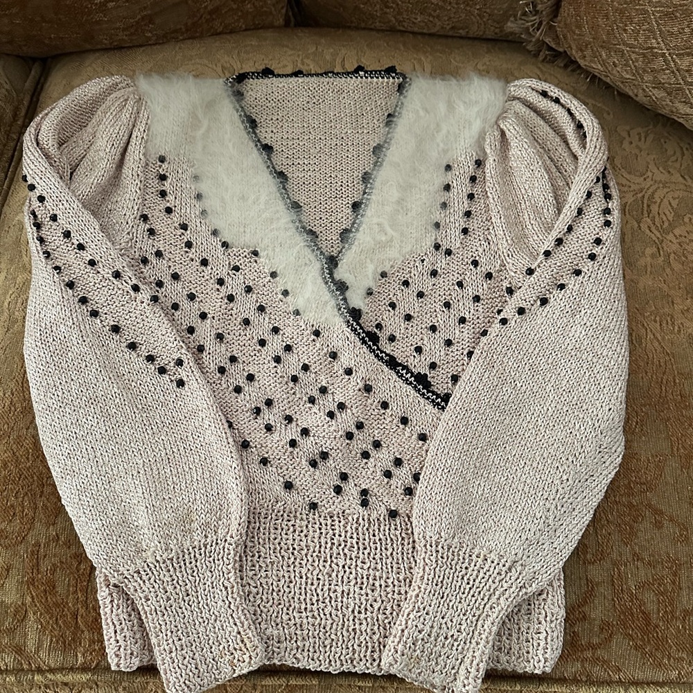 Elegant Cream Sweater with Black Accents